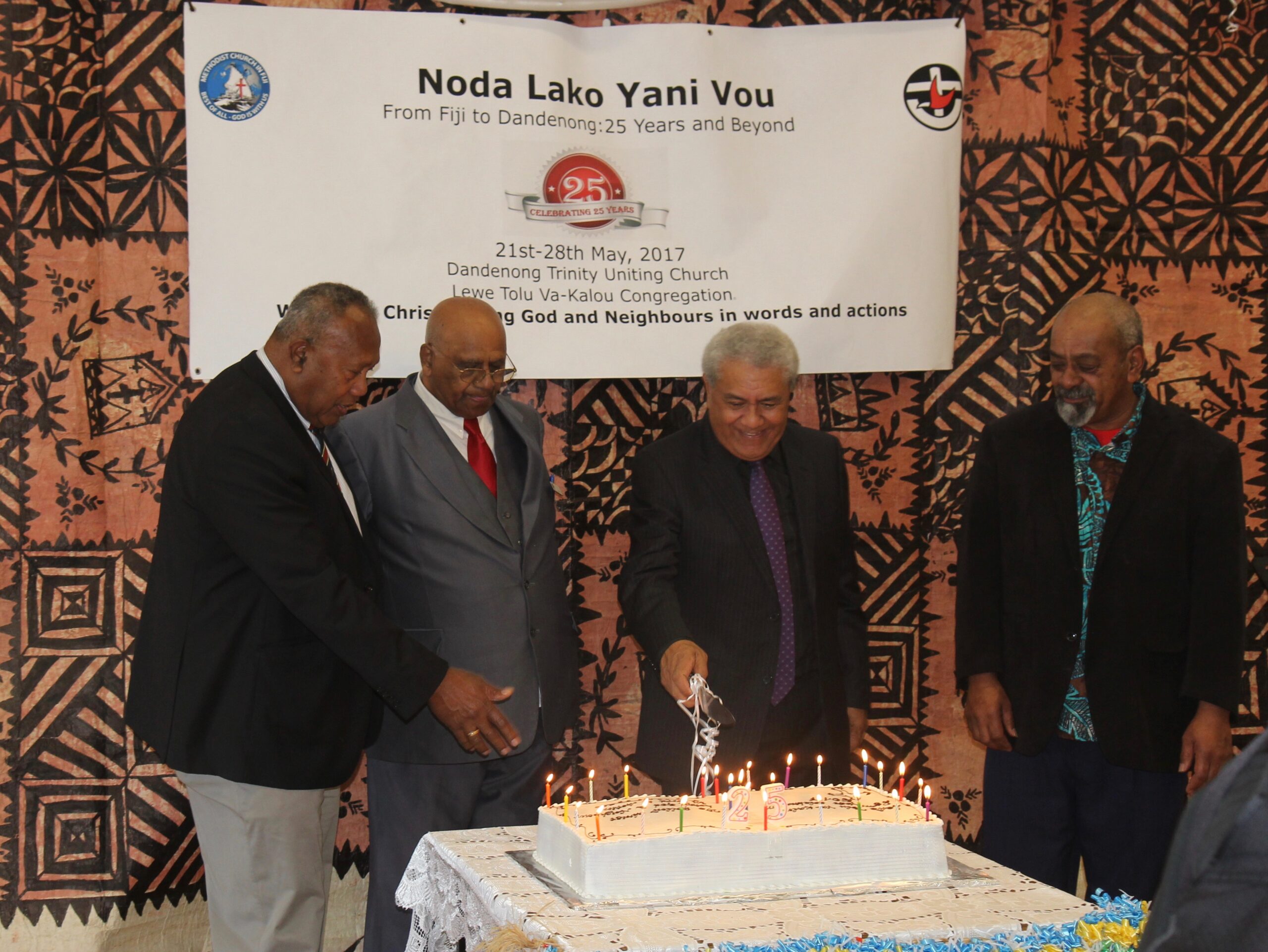 Cutting of the cake at the time of the 25th Anniversary of the Lewe Tolu Va-Kalou congregation with Nigel Bitu, Jim Smith, Rev. Jason Kioa and Isireli Cama.